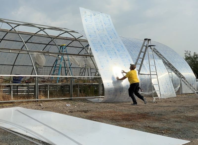 Installing a 4-layer polycarbonate panel onto a high-tunnel frame